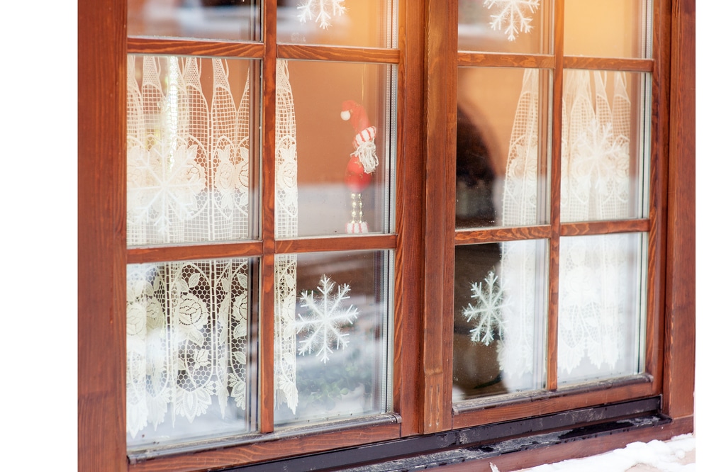 Wood window decorated with snowflakes