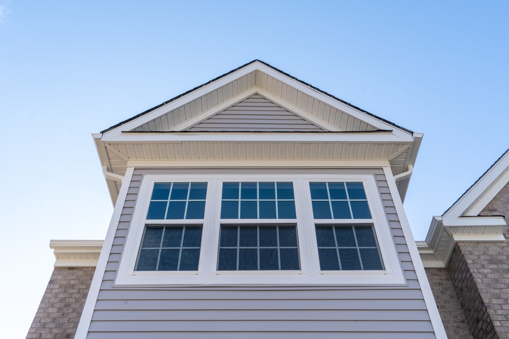 Double hung window under a gable and soffit